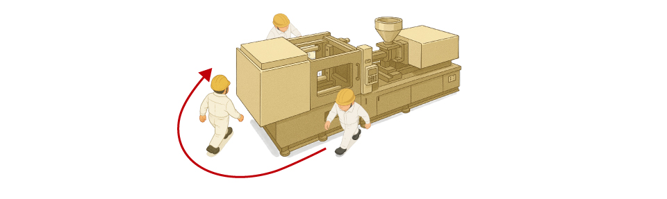 Before installation of auto clamps with incomplete clamp detection, an operator checks the clamp lock status on the non-operator side of the injection molding machine.
